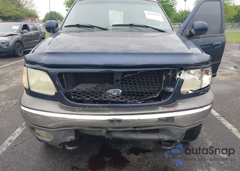 2002 Ford F-150 Lariat/Xlt z USA, uszkodzony, nr VIN 1FTRW08L32KB95040